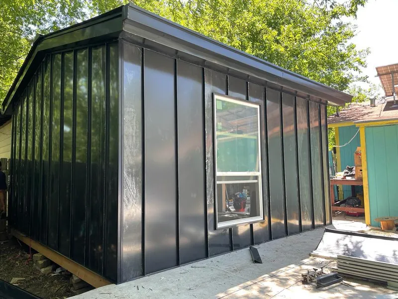 Black standing seam metal wall panels for Roof Inspection in London Grove