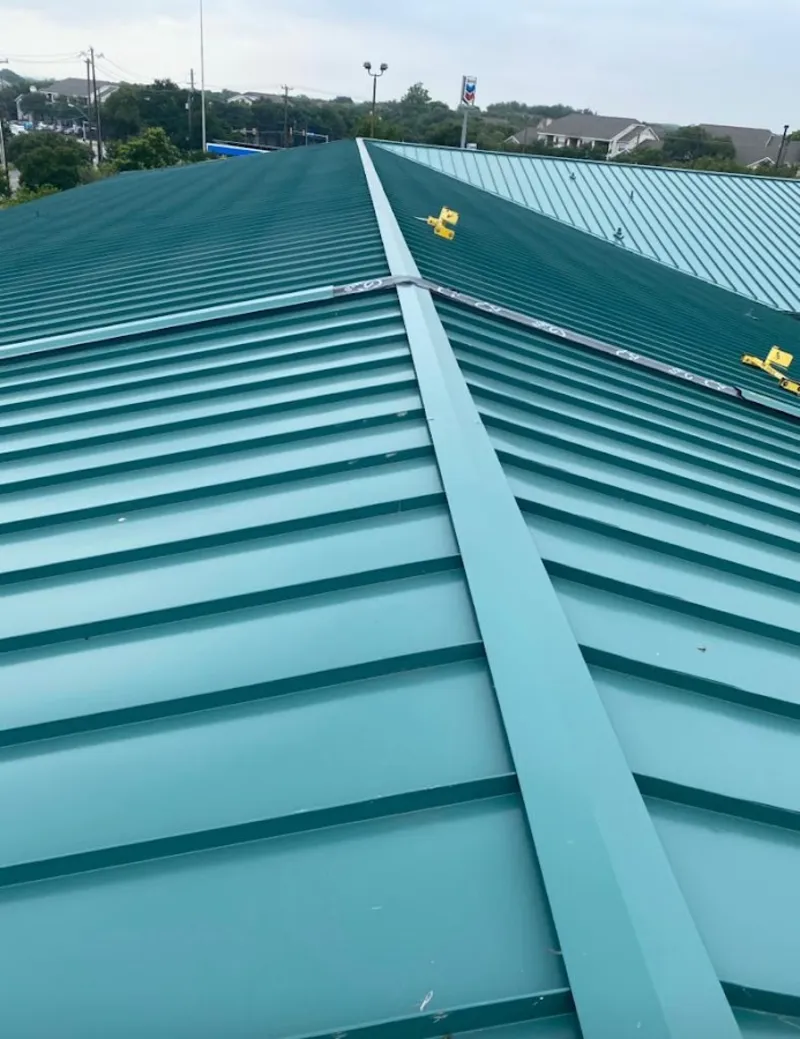 Green commercial metal roof ridge and valley for Metal Roof Repair in London Grove